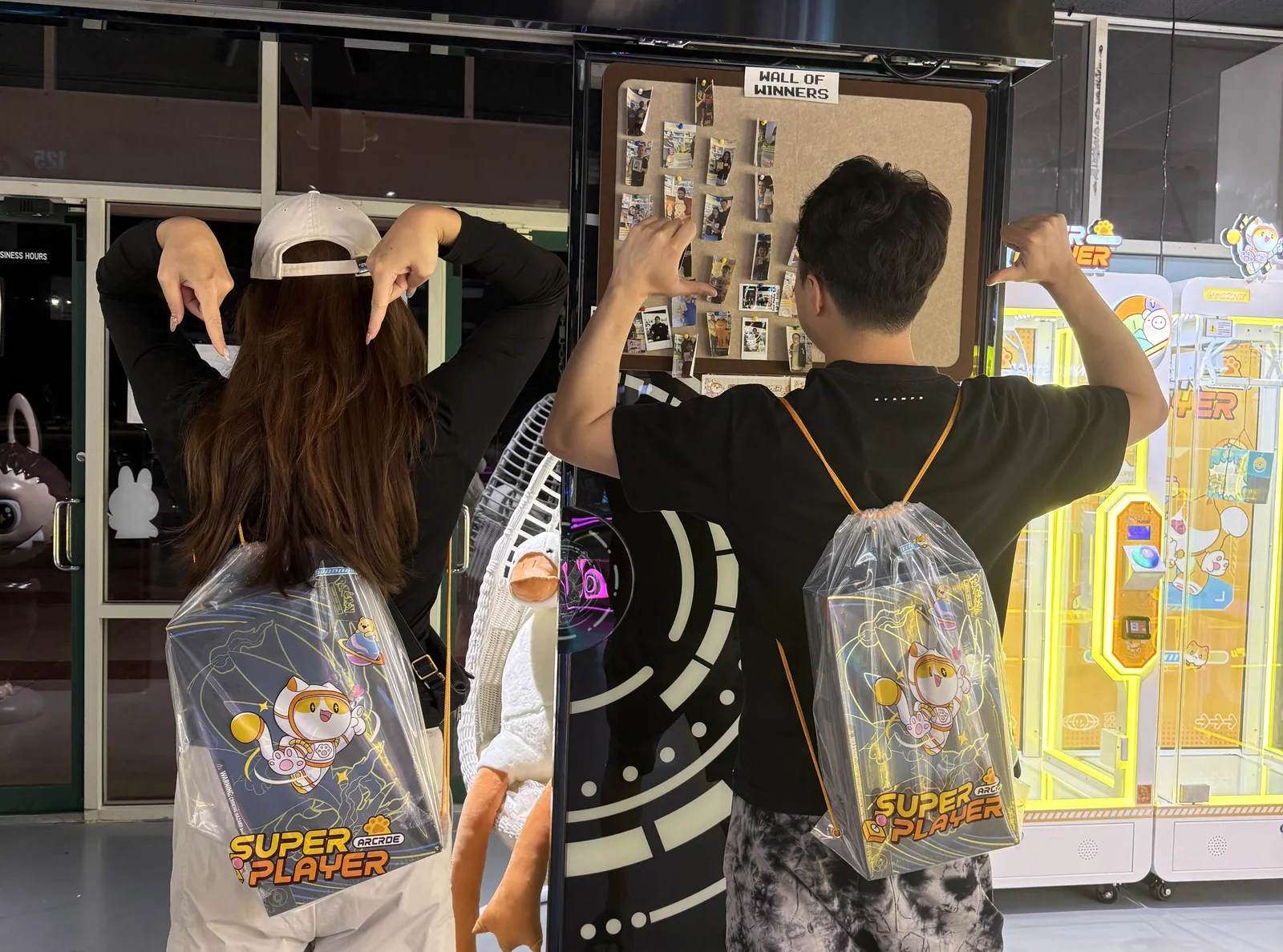 Friends posing with their prize haul