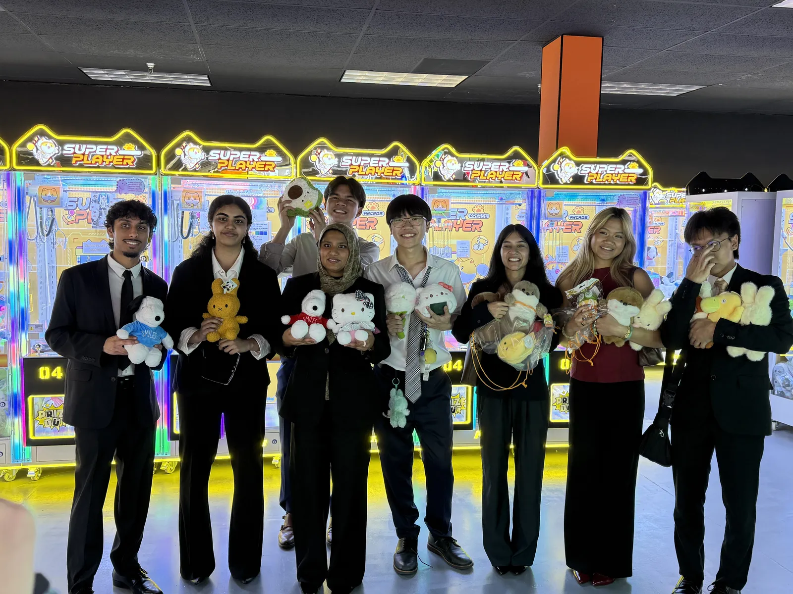 Group at the prize wall